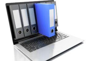 ノートPC上のファイルボックスのイメージ。書類の電子化を表現した画像